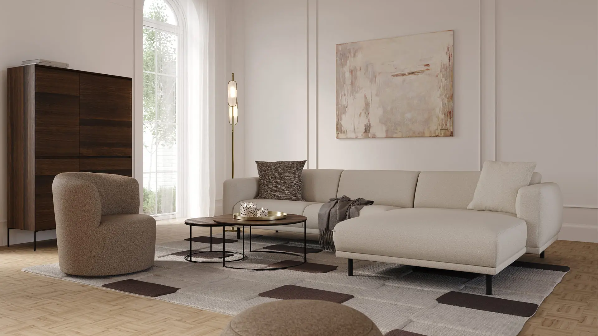 Fauteuil Orvietto en tissu bouclé taupe dans un salon lumineux, avec tables basses rondes et canapé beige en arrière-plan.