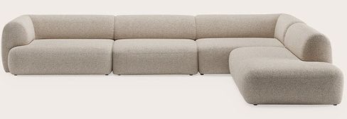 Canapé d’angle modulaire avec plusieurs modules d’assise et accoudoirs arrondis, revêtu de tissu beige clair sur fond neutre.