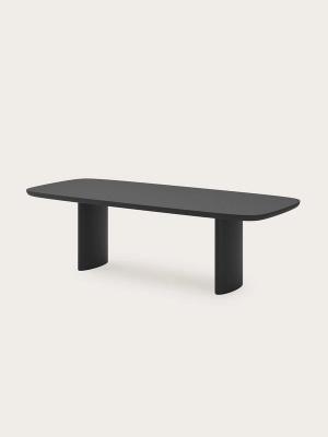Amato eettafel in zwart hout met afgeronde hoeken, langwerpig blad en twee brede, afgeronde poten.