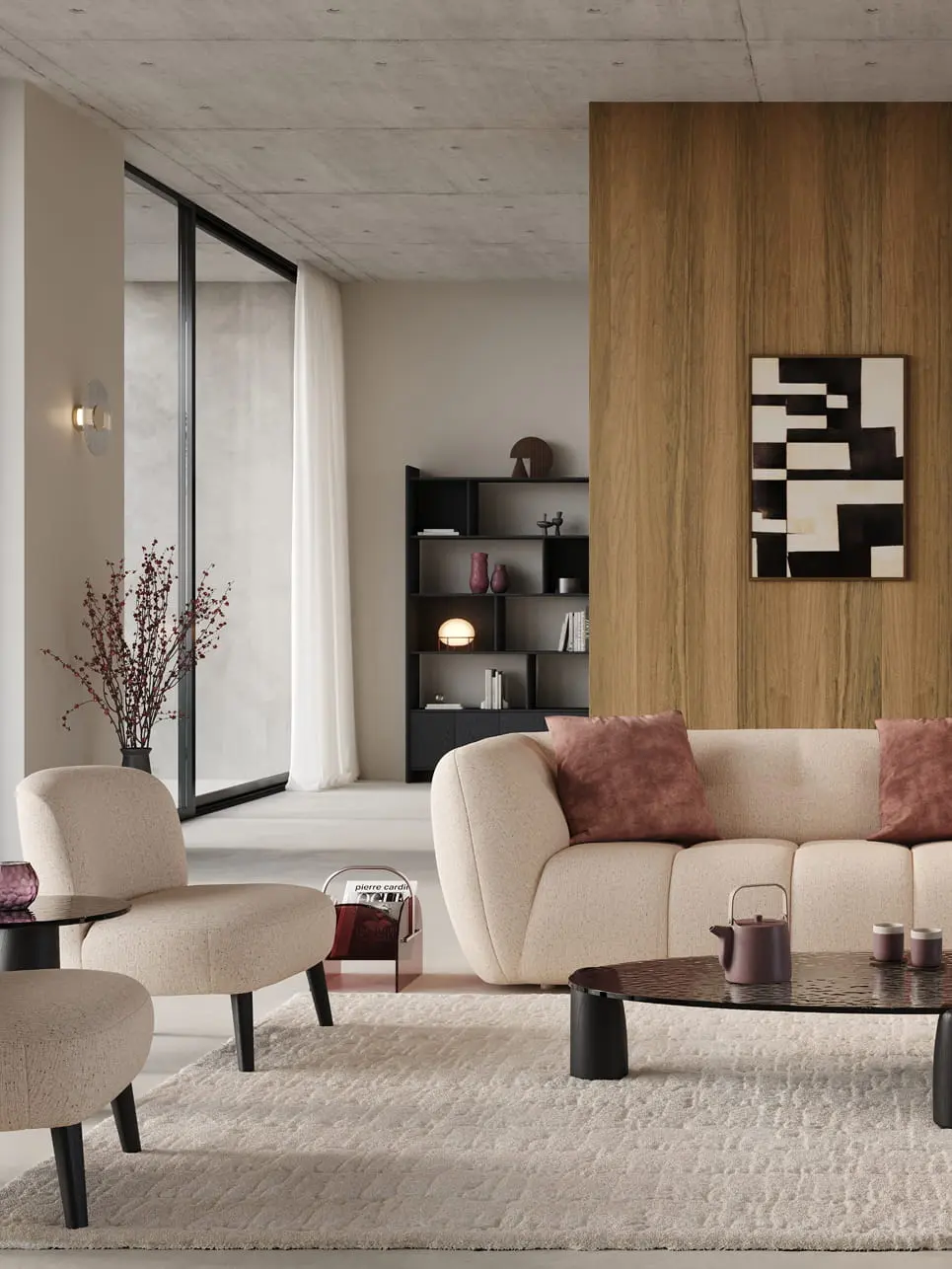 Fauteuil Aviano en tissu clair avec pieds noirs, dans un salon contemporain avec canapé beige, table basse noire et cheminée.