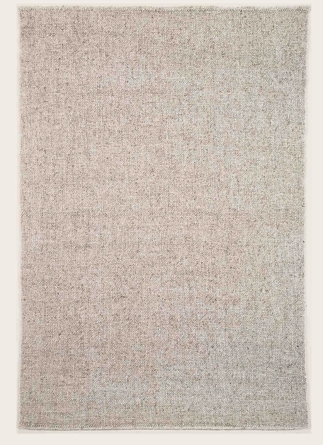Rechthoekig tapijt in beige en bruin met een subtiel patroon, geplaatst op een lichte ondergrond