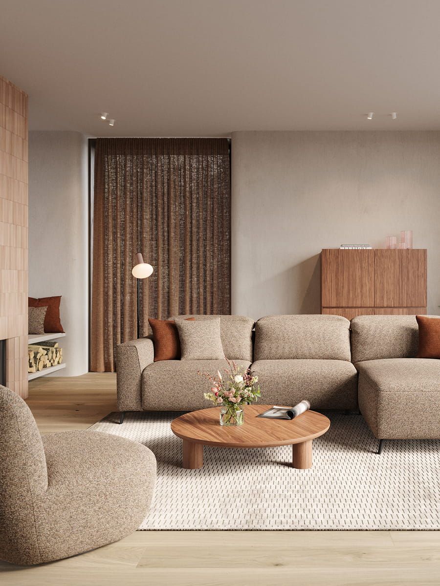 Canapé modulaire Monza beige avec chaise longue dans un salon chaleureux, table basse ronde en bois et coussins.