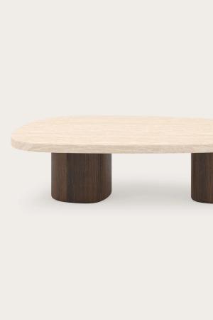 Salontafel met afgerond licht stenen blad en centrale cilindervormige voet in donker hout.