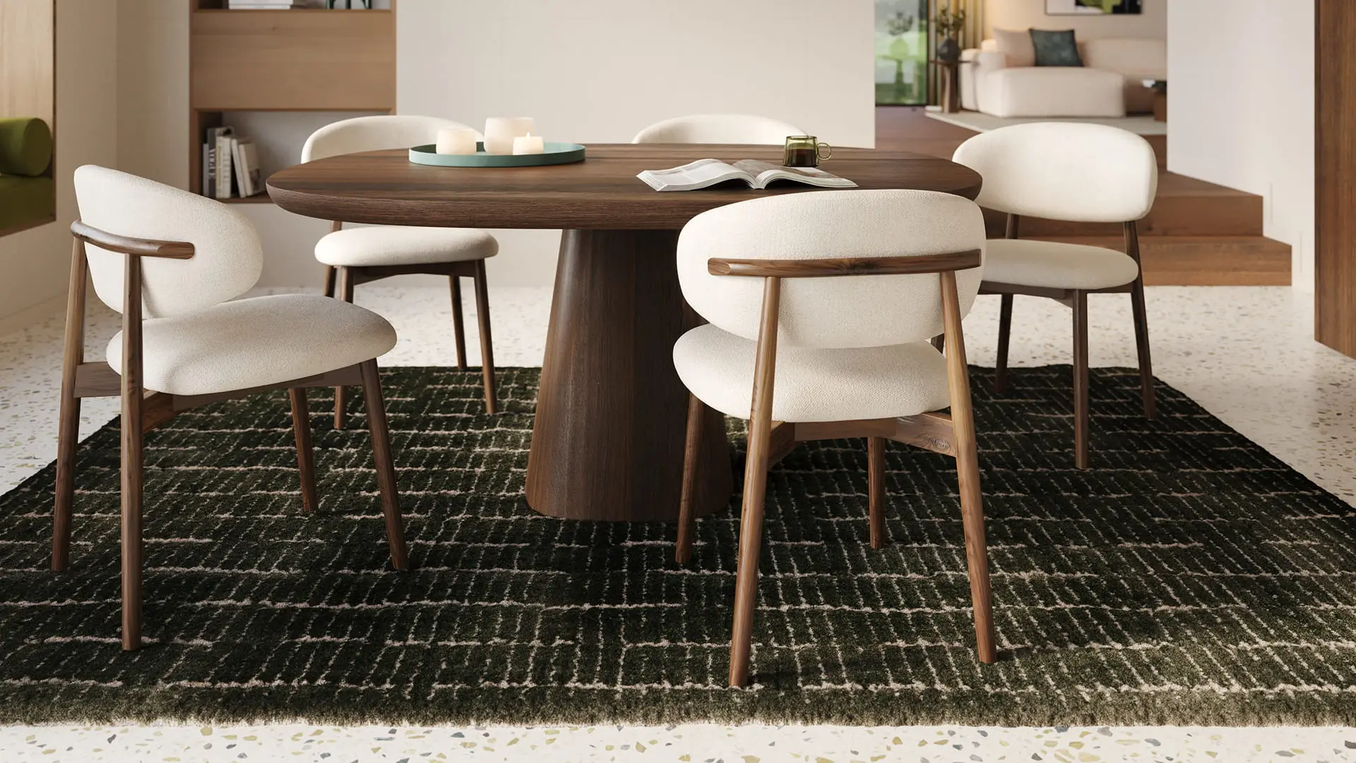 Chaise Piola avec structure en bois et assise rembourrée claire autour d’une table ronde en bois dans un intérieur moderne et chaleureux.